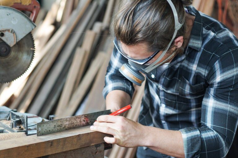 carpenter man working on woodworking